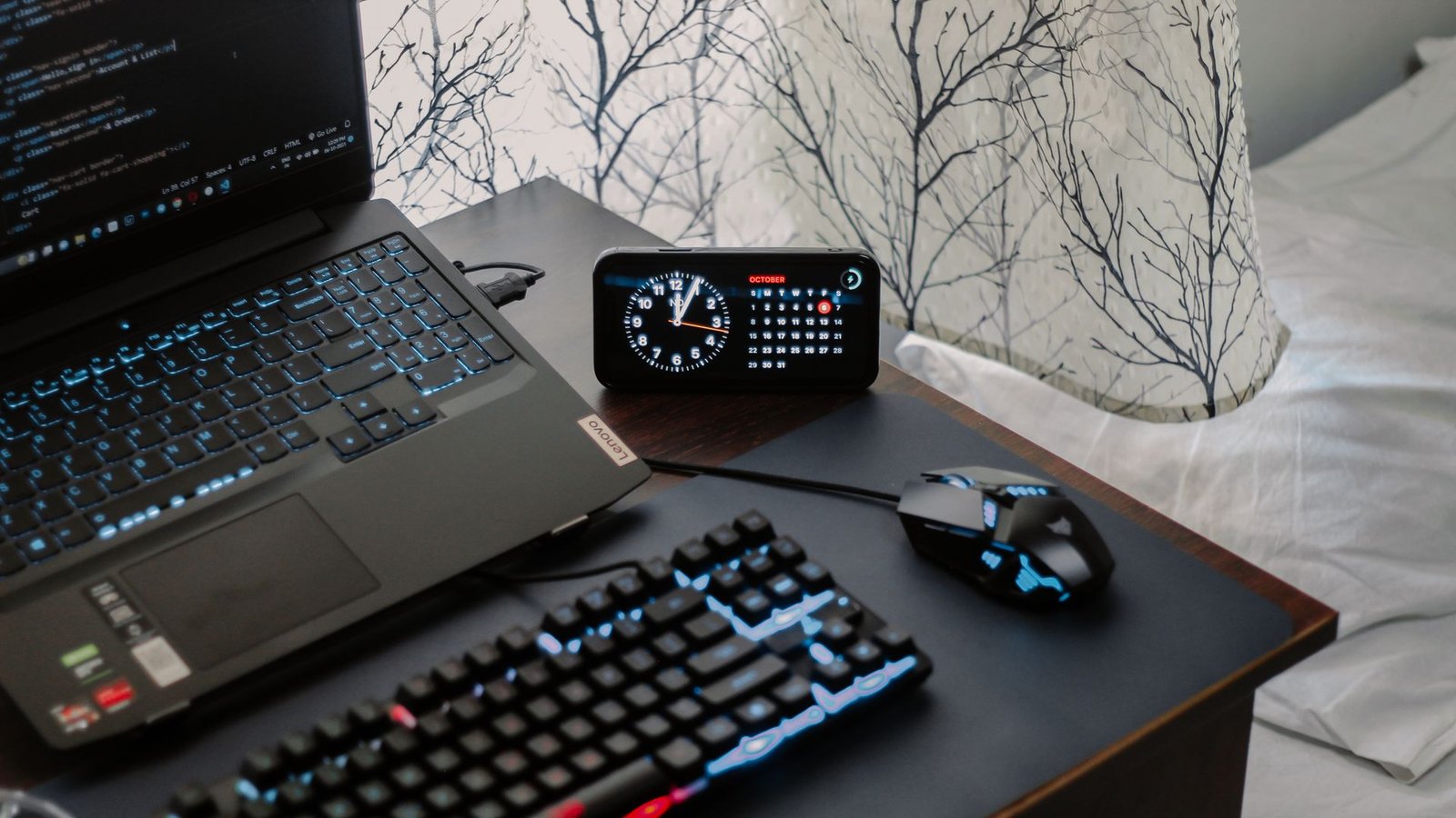 home office desk setup with laptop, keyboard and mouse