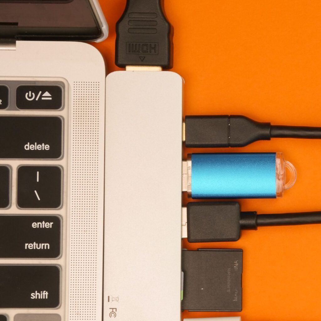 USB-C docking station connected to a laptop with multiple devices