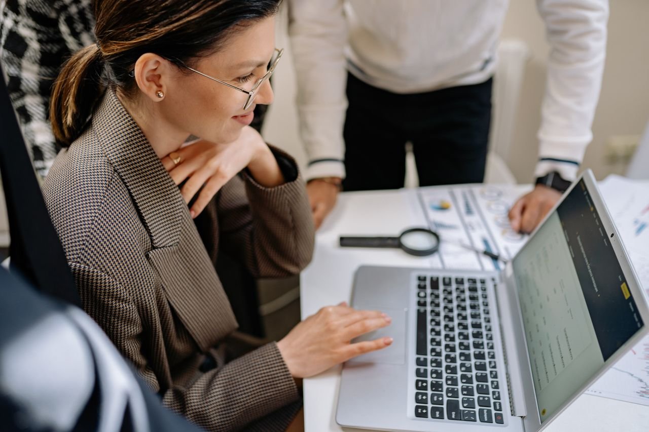 Business professionals using AI tools to improve productivity
